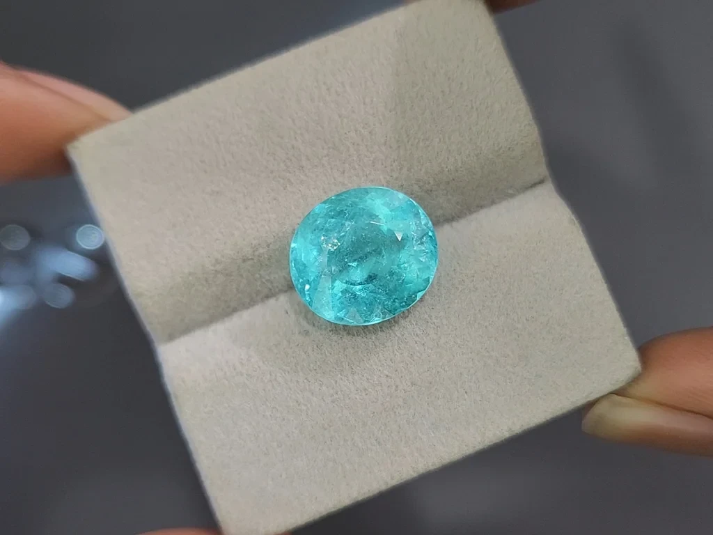 Сахарный неоново-голубой турмалин Параиба в огранке овал 8,92 карат, Мозамбик Изображение №4