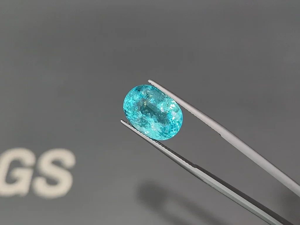 Неоновый зеленовато-голубой турмалин Параиба в огранке овал 9,91 карат, Мозамбик Изображение №3