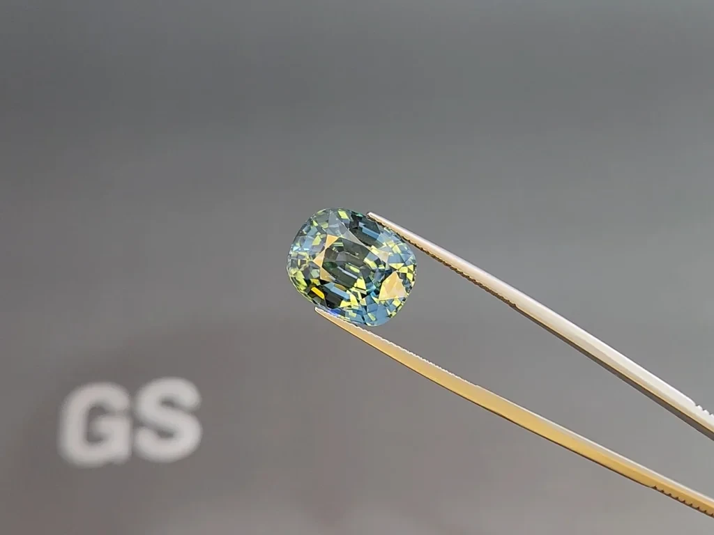 Циркон со сменой цвета от фиолетового к зеленому в огранке кушон 15,20 карат, Бирма Изображение №6