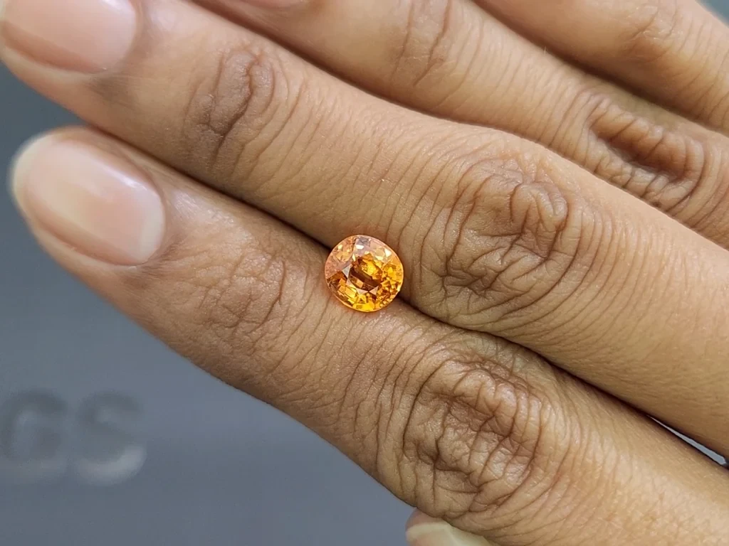 Гранат спессартин Fanta color в огранке кушон 2,26 карат, Африка Изображение №2