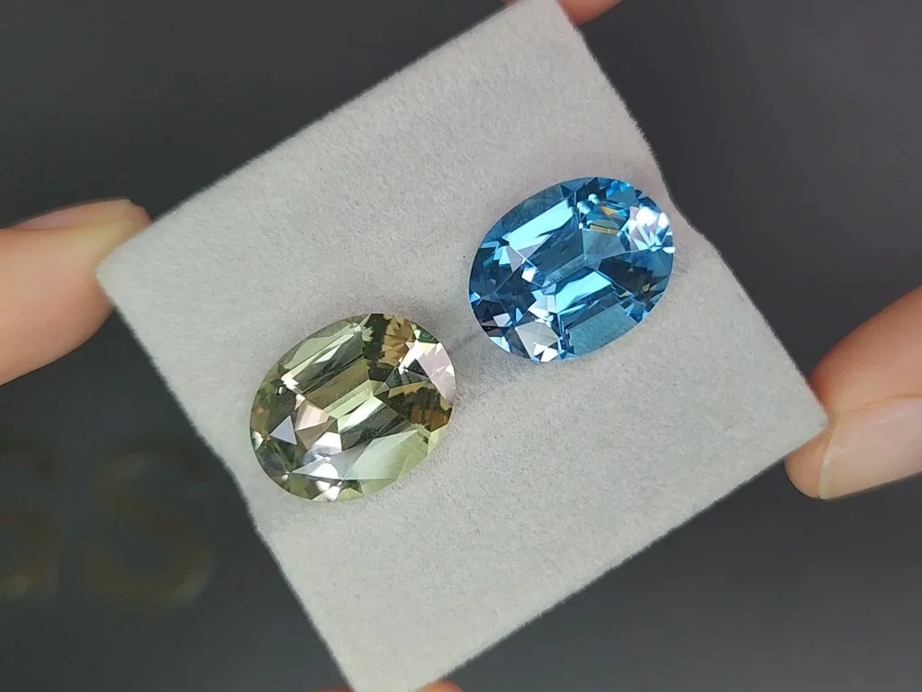 Контрастная пара из Sky blue topaz и празиолита (зеленого кварца) в высокоточной огранке овал 19,48 карата  Изображение №4