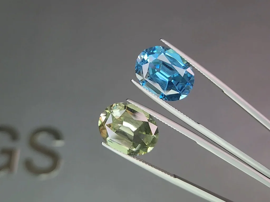 Контрастная пара из Sky blue topaz и празиолита (зеленого кварца) в высокоточной огранке овал 19,48 карата  Изображение №3